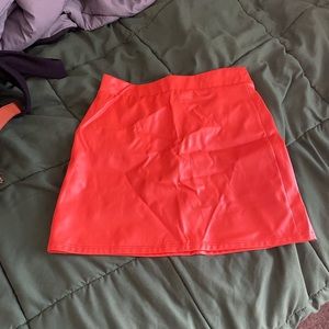 Orange leather mini skirt